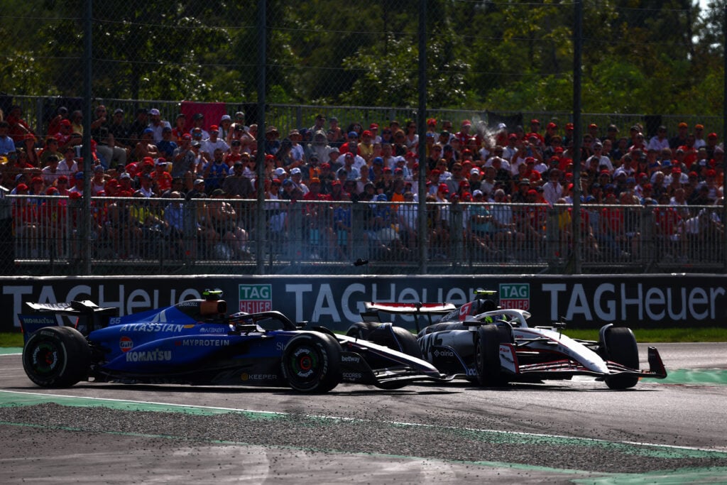 Haas driver Oliver Bearman and Carlos Sainz of Williams spin after crashing in the 2025 F1 Italian Grand Prix at Monza