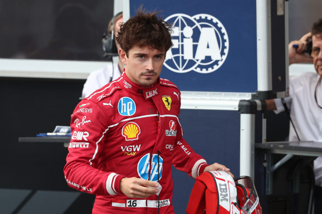 Ferrari driver Charles Leclerc carrying his helmet after qualifying for the 2025 Formula 1 Azerbaijan Grand Prix