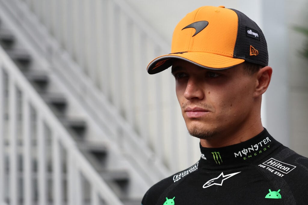 McLaren driver Lando Norris with his cap over his face at the 2025 Formula 1 Azerbaijan Grand Prix