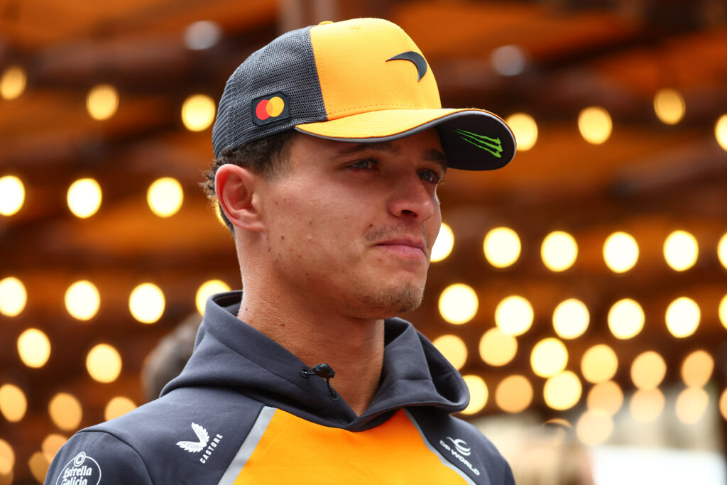 McLaren driver Lando Norris arrives in the Baku paddock before practice for the 2025 F1 Azerbaijan Grand Prix