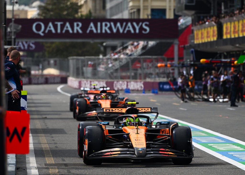 McLaren drivers Lando Norris and Oscar Piastri leaving the pit lane at the 2025 Formula 1 Azerbaijan Grand Prix