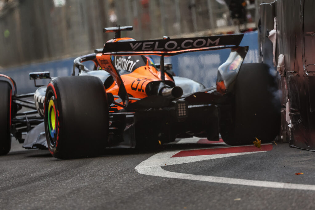 Oscar Piastri of McLaren contacts the wall during qualifying at the 2025 Azerbaijan Grand Prix