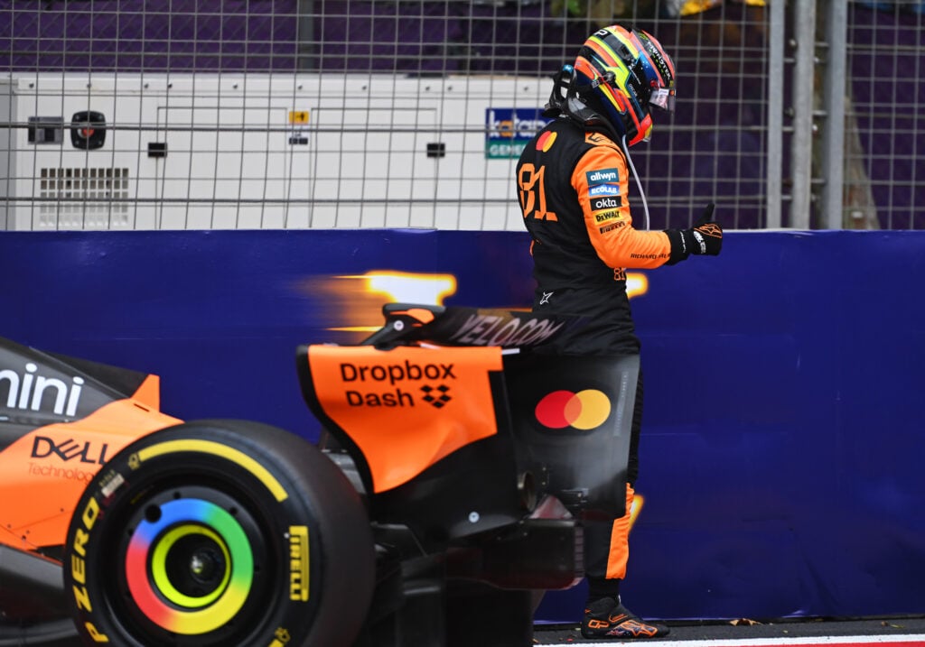 Oscar Piastri walks away from his McLaren after a race-ending crash in the 2025 F1 Azerbaijan Grand Prix
