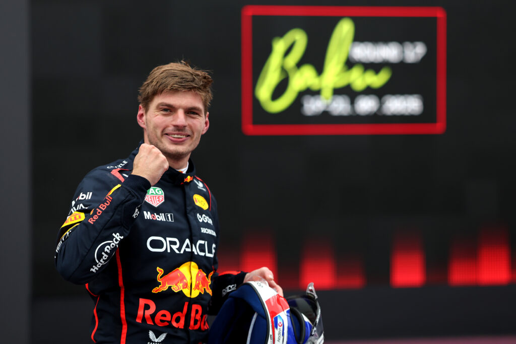 Max Verstappen celebrating his win at the 2025 Azerbaijan Grand Prix in parc ferme.