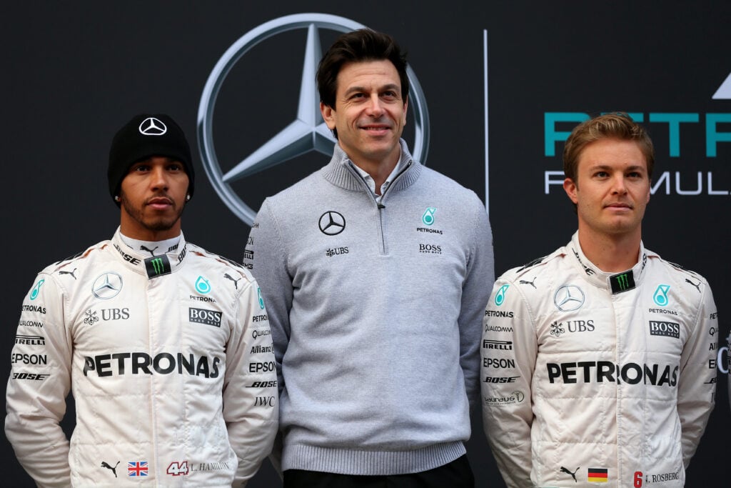 Mercedes drivers Lewis Hamilton and Nico Rosberg with team principal Toto Wolff at 2016 Formula 1 pre-season testing at Barcelona