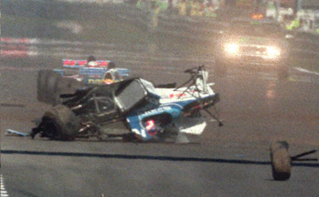 Tyrrell driver Ukyo Katayama's car left destroyed and upside down after a crash with Minardi's Luca Badoer at the 1995 Portuguese Grand Prix