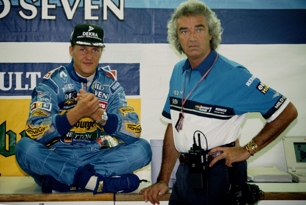 Flavio Briatore and Michael Schumacher in the Benetton F1 garage