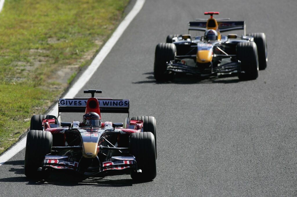 Scott Speed of Toro Rosso and David Coulthard of Red Bull at the 2006 Japanese Grand Prix