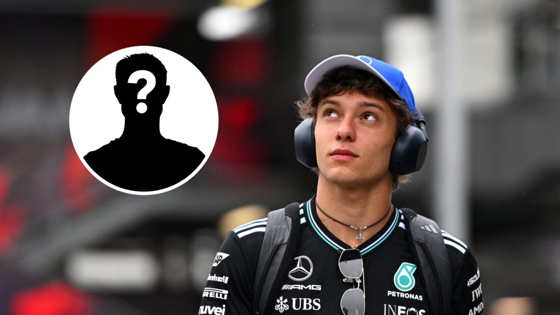 Mercedes driver Andrea Kimi Antonelli walking through the paddock wearing headphones at the 2025 Formula 1 Azerbaijan Grand Prix