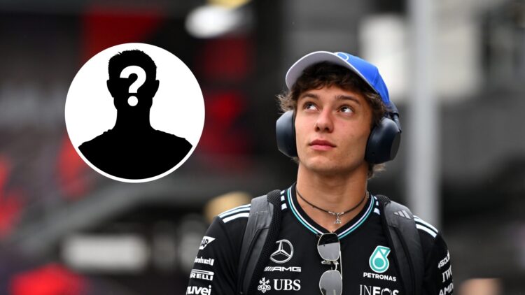 Mercedes driver Andrea Kimi Antonelli walking through the paddock wearing headphones at the 2025 Formula 1 Azerbaijan Grand Prix