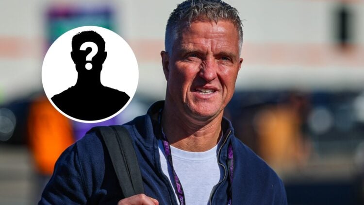 Ralf Schumacher wearing a backpack and walking through the paddock at the 2025 Formula 1 Dutch Grand Prix