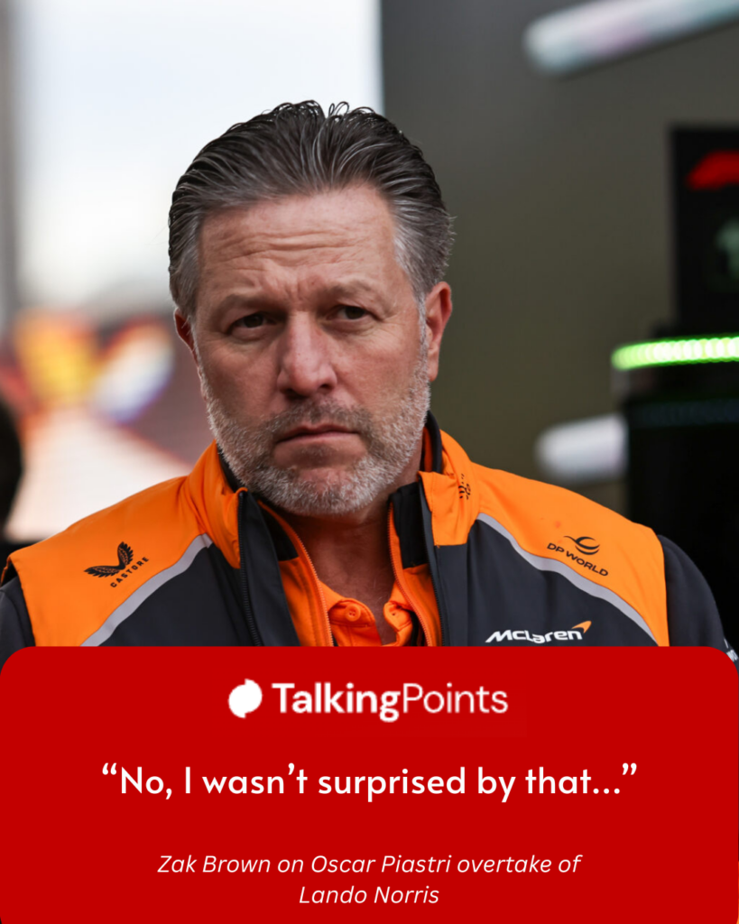 Zak Brown of McLaren arrives in the F1 paddock