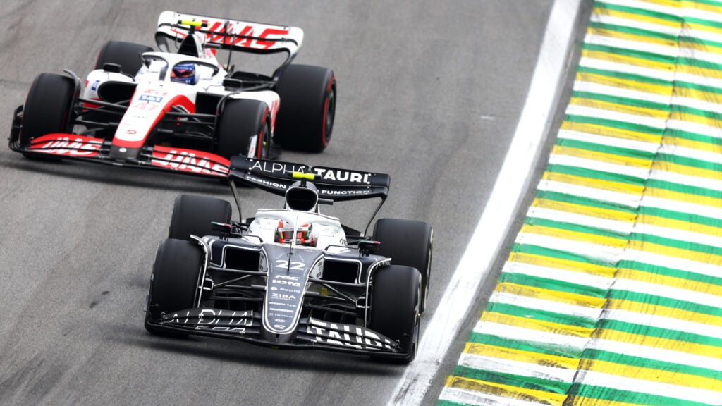 AlphaTauri driver Yuki Tsunoda racing Haas driver Mick Schumacher at the 2022 Formula 1 Brazilian Grand Prix