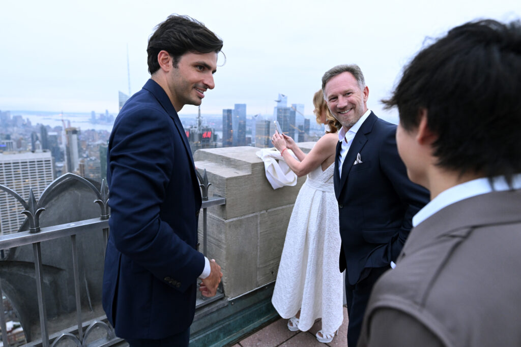 Carlos Sainz and Christian Horner speak with Yuki Tsunoda at Rockefeller Center before the F1 Movie premiere