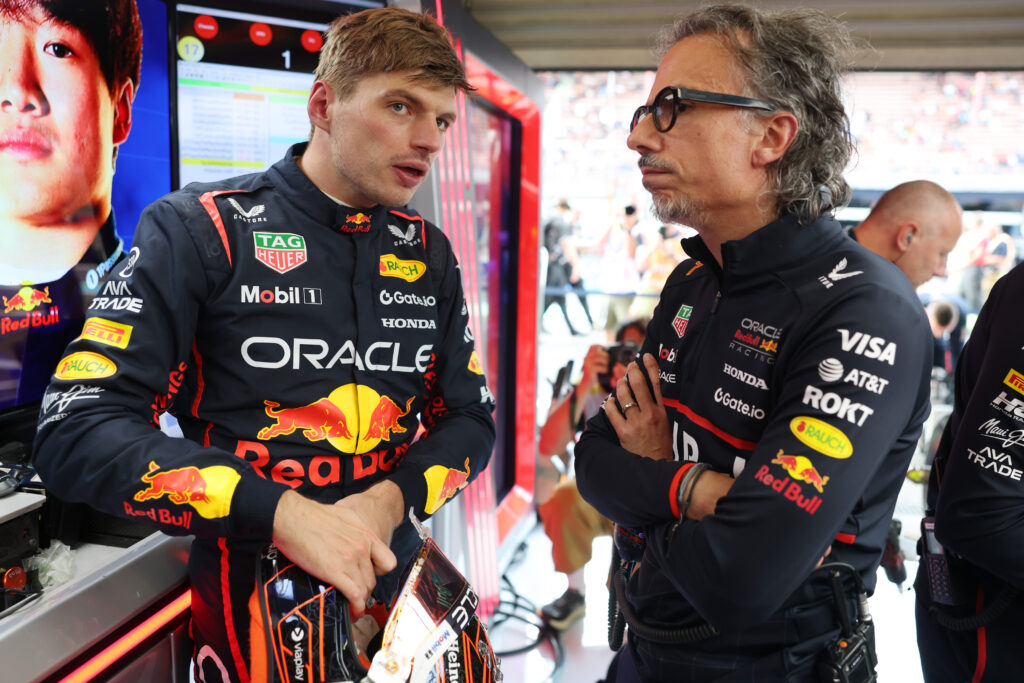 Red Bull driver Max Verstappen speaking to team principal Laurent Mekies at the 2025 Formula 1 Belgian Grand Prix