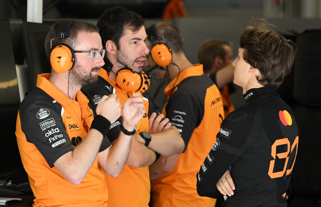 Oscar Piastri in discussions with McLaren staff during the 2025 Formula 1 Hungarian Grand Prix