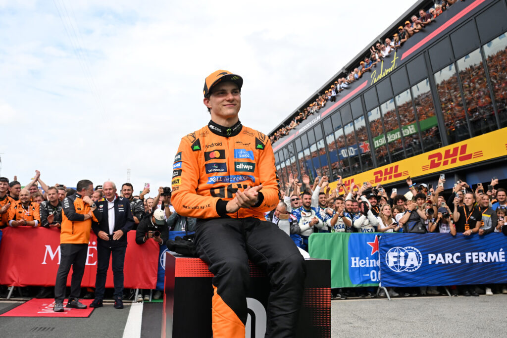 Oscar Piastri of McLaren applauds in parc ferme after winning the Dutch Grand Prix