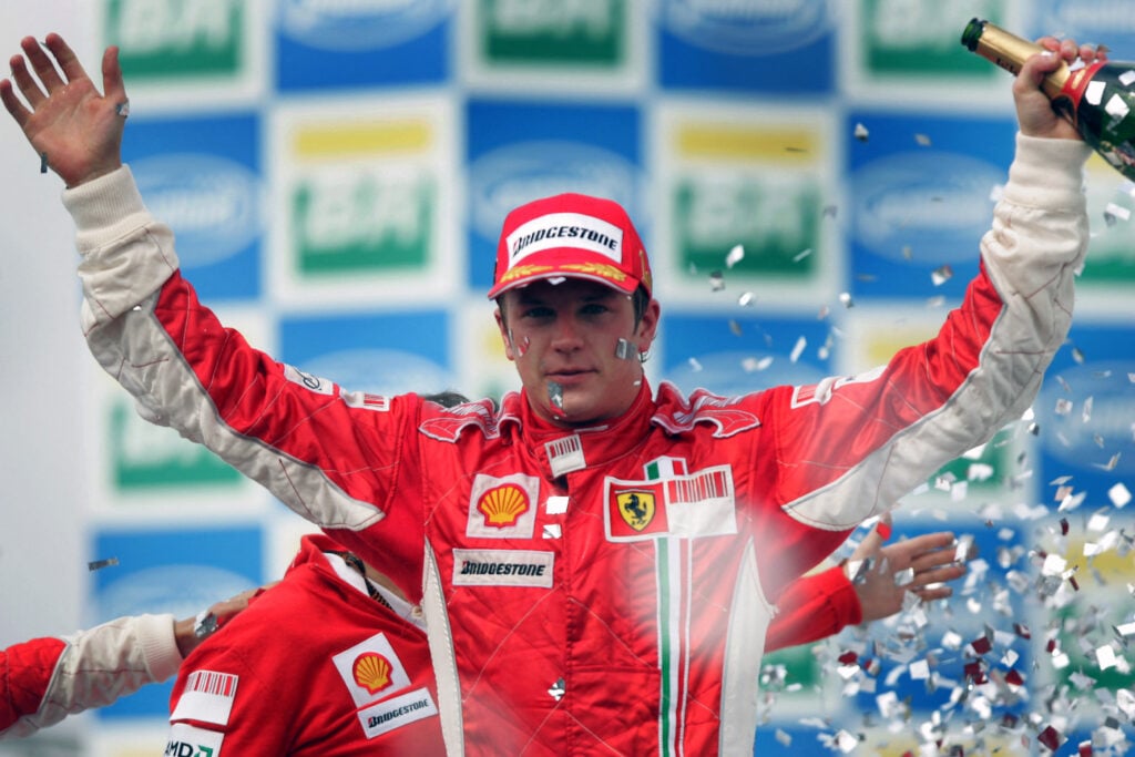 Ferrari driver Kimi Raikkonen celebrating winning the 2007 Formula 1 Brazilian Grand Prix