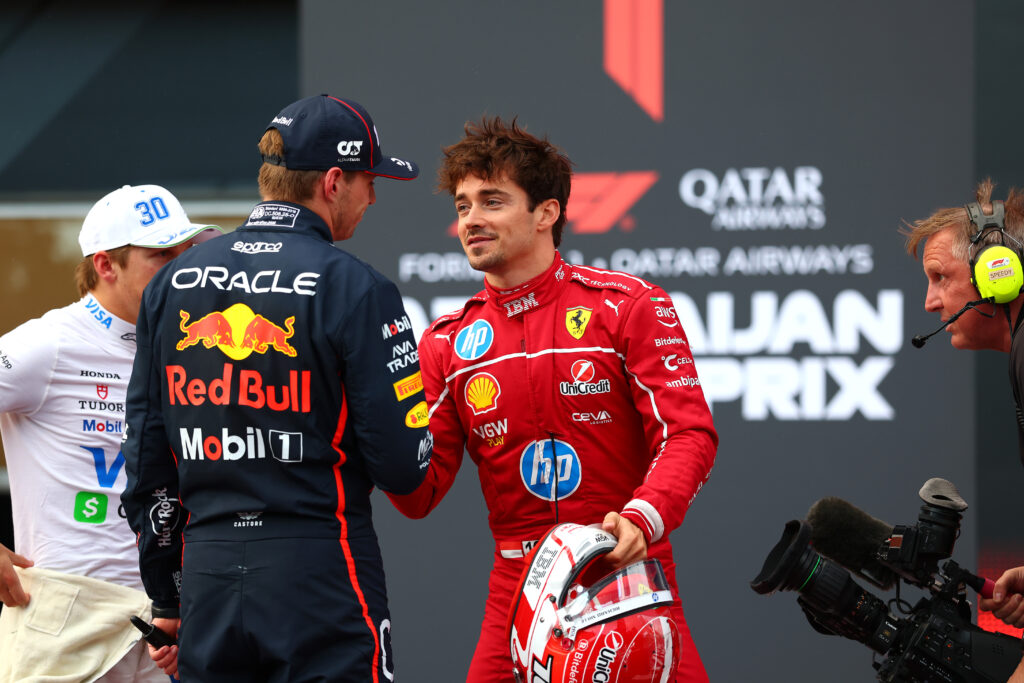 Charles Leclerc of Ferrari congratulates Max Verstappen of Red Bull after Azerbaijan Grand Prix qualifying