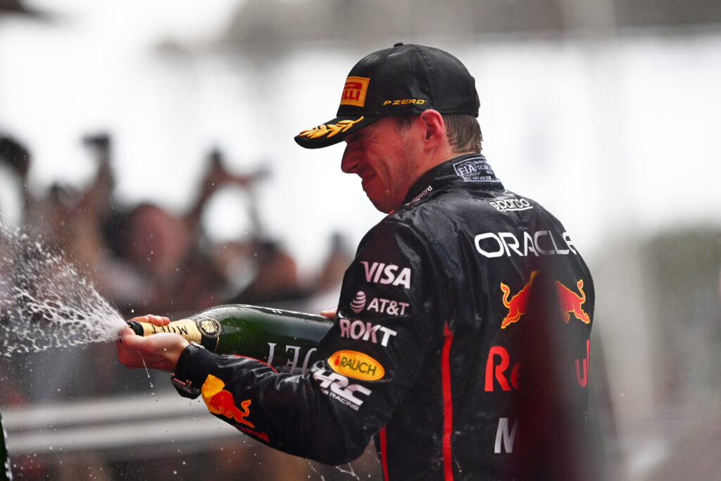 Red Bull driver Max Verstappen spraying champagne at the 2025 Formula 1 Azerbaijan Grand Prix