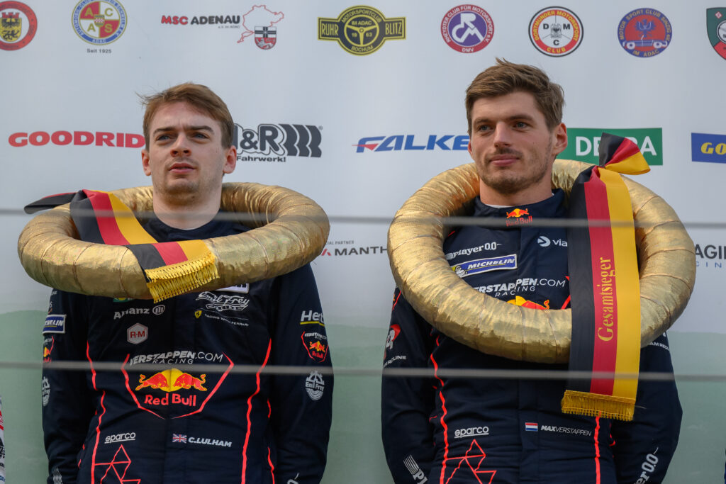 Chris Lulham (left) and Max Verstappen (right) on the podium after winning the ADAC Nürburgring Langstrecken-Serie