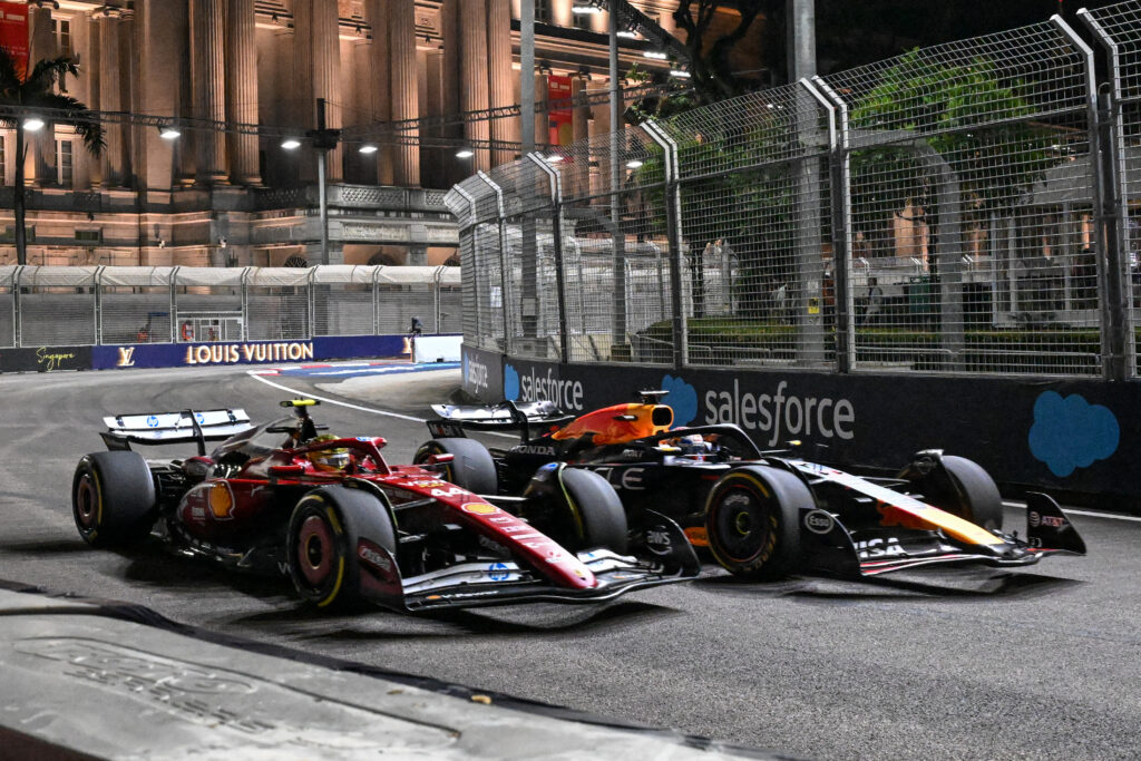 Ferrari's Lewis Hamilton on track with Red Bull's Max Verstappen during practice for the 2025 F1 Singapore Grand Prix
