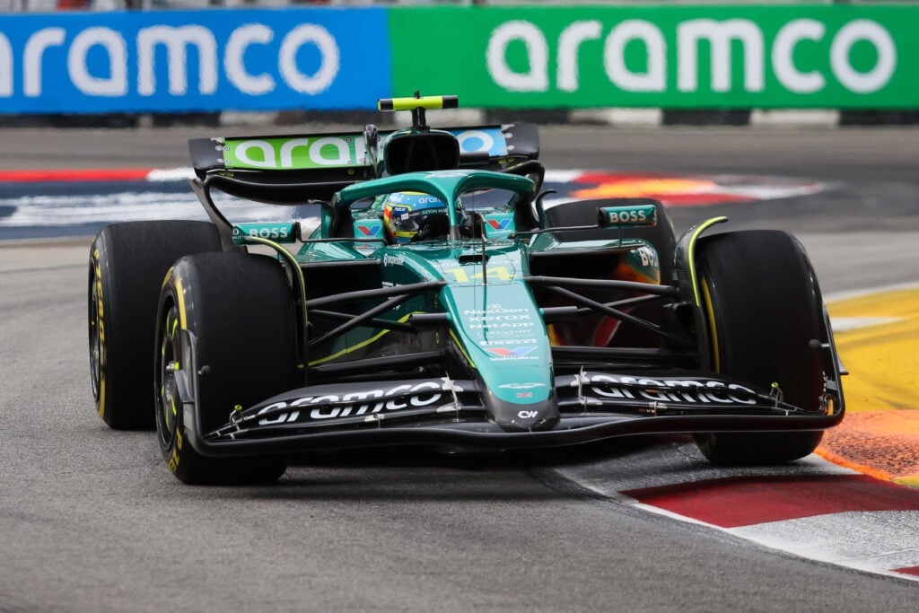 Aston Martin driver Fernando Alonso racing at the 2025 Formula 1 Singapore Grand Prix