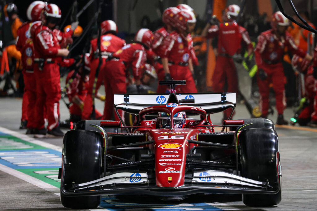 Ferrari driver Charles Leclerc makes a pit stop during the 2025 F1 Singapore Grand Prix