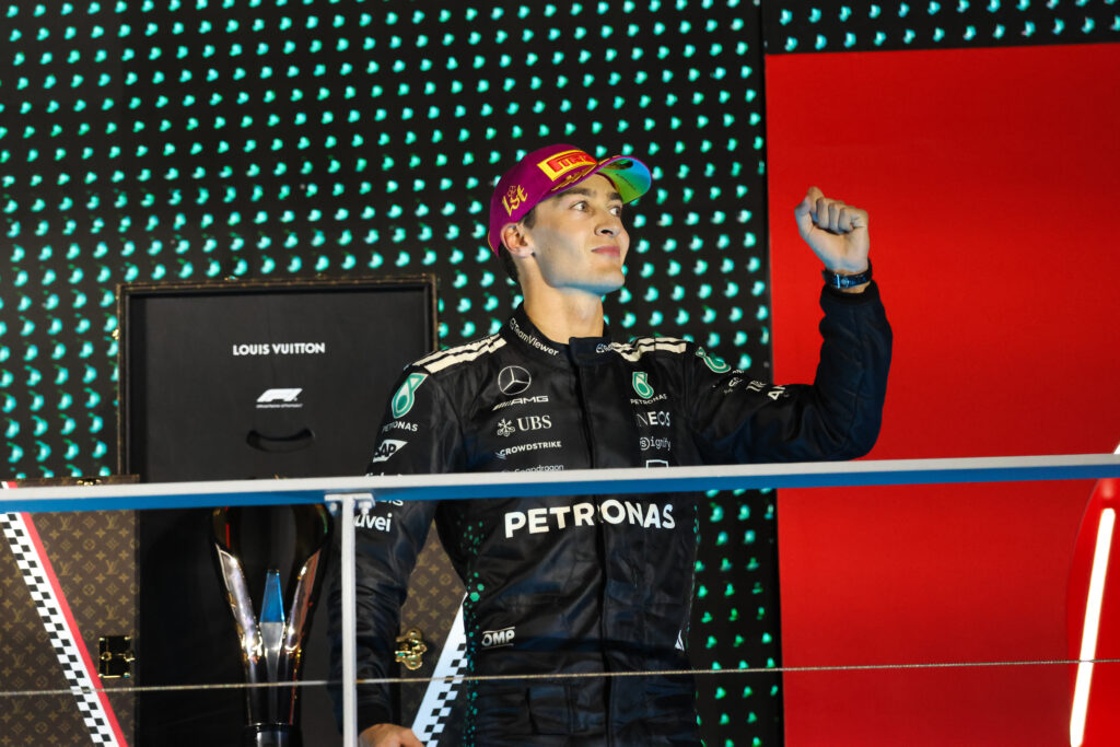 George Russell of Mercedes pumps his fist on the Singapore Grand Prix podium