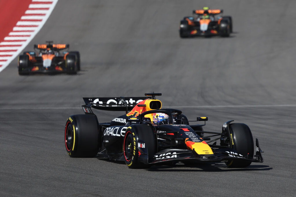 Red Bull driver Max Verstappen leads McLaren's Lando Norris and Oscar Piastri on the COTA Sprint formation lap at the 2025 F1 United States Grand Prix