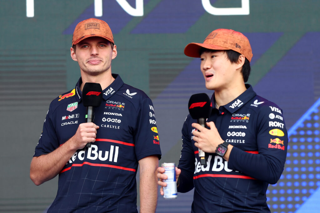 Red Bull drivers Max Verstappen and Yuki Tsunoda on stage at the 2025 Formula 1 United States Grand Prix