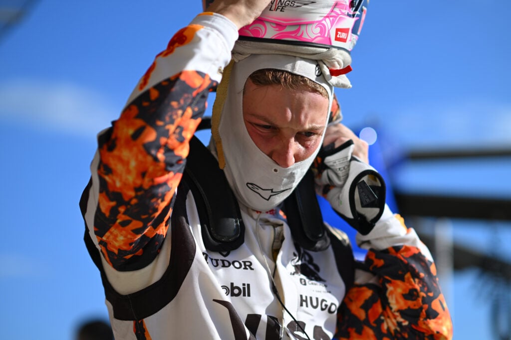 Racing Bulls driver Liam Lawson adjusting his helmet at the 2025 Formula 1 United States Grand Prix