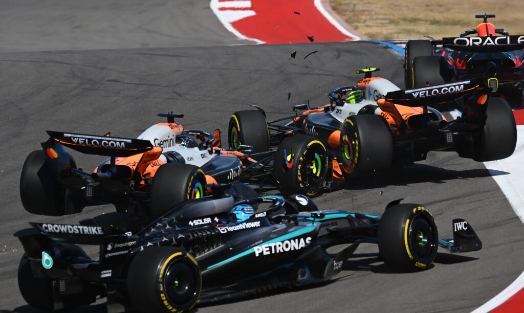 McLaren drivers Lando Norris and Oscar Piastri crashing into each other during the Sprint Race at the 2025 Formula 1 United States Grand Prix