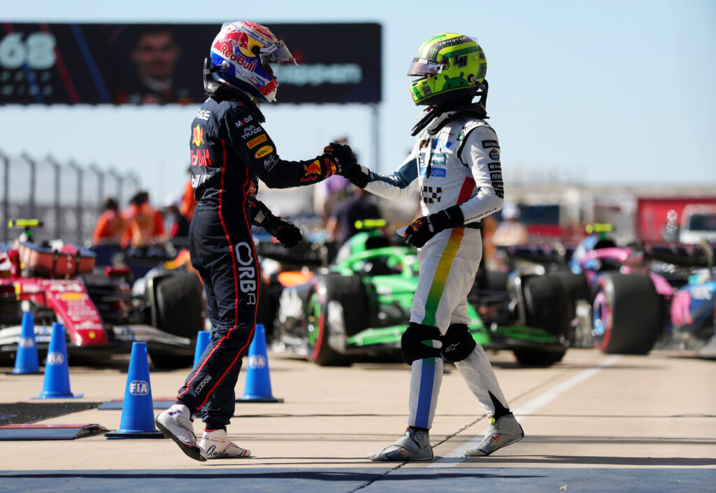 Red Bull driver Max Verstappen and McLaren driver Lando Norris shaking hands after the 2025 Formula 1 United States Grand Prix