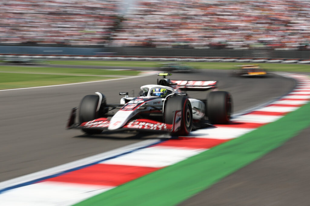 Haas driver Oliver Bearman racing ahead of McLaren driver Oscar Piastri at the 2025 Formula 1 Mexico City Grand Prix