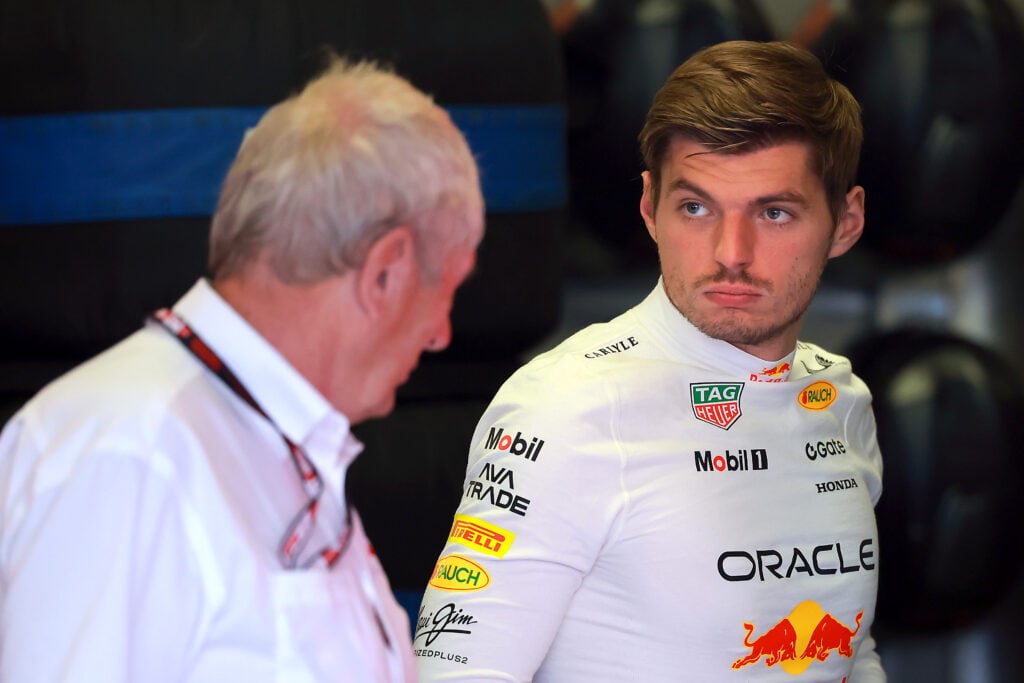 Helmut Marko speaks to Max Verstappen in the Red Bull garage at the 2025 Mexico City Grand Prix