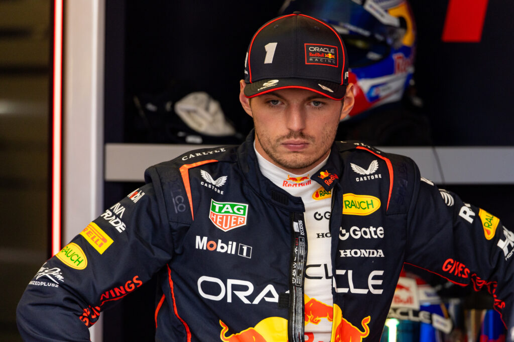 Max Verstappen of Red Bull stands in his garage at the 2025 Mexican Grand Prix
