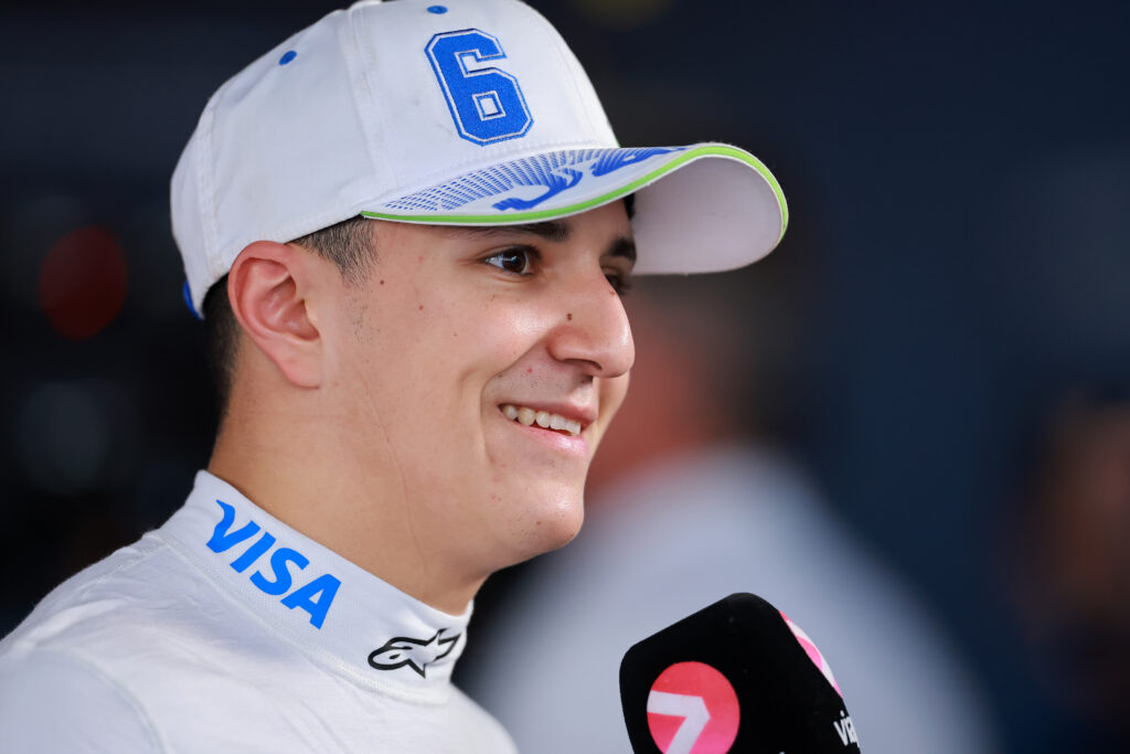 Isack Hadjar of Racing Bulls speaks in the media pen at the Mexican Grand Prix