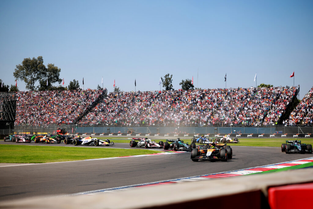 Williams driver Carlos Sainz uses the Turn 1 run-off after crashing with Racing Bulls' Liam Lawson in the 2025 F1 Mexico City Grand Prix
