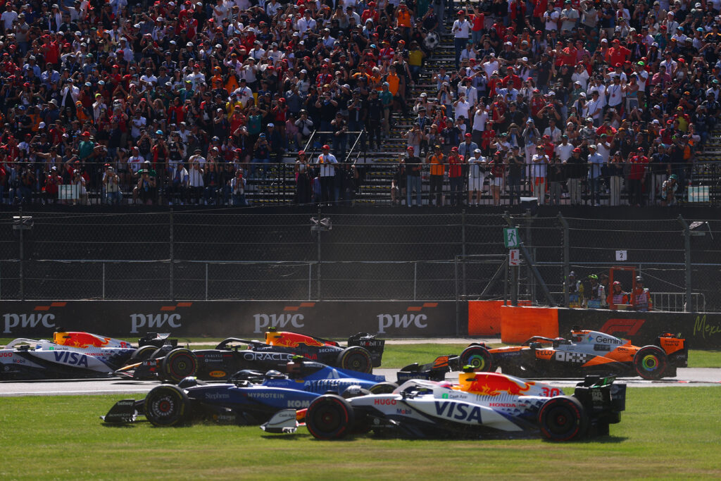 Williams driver Carlos Sainz uses the Turn 1 run-off after crashing with Racing Bulls' Liam Lawson in the 2025 F1 Mexico City Grand Prix