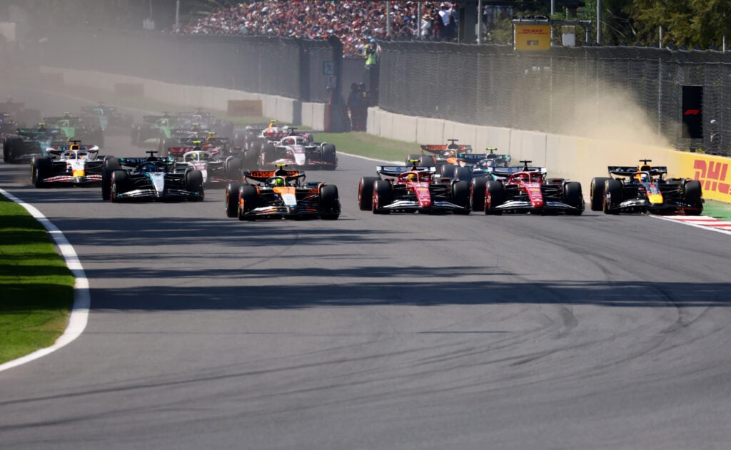 Ferrari drivers Charles Leclerc and Lewis Hamilton fight Red Bull's Max Verstappen at the start of the 2025 F1 Mexico City Grand Prix