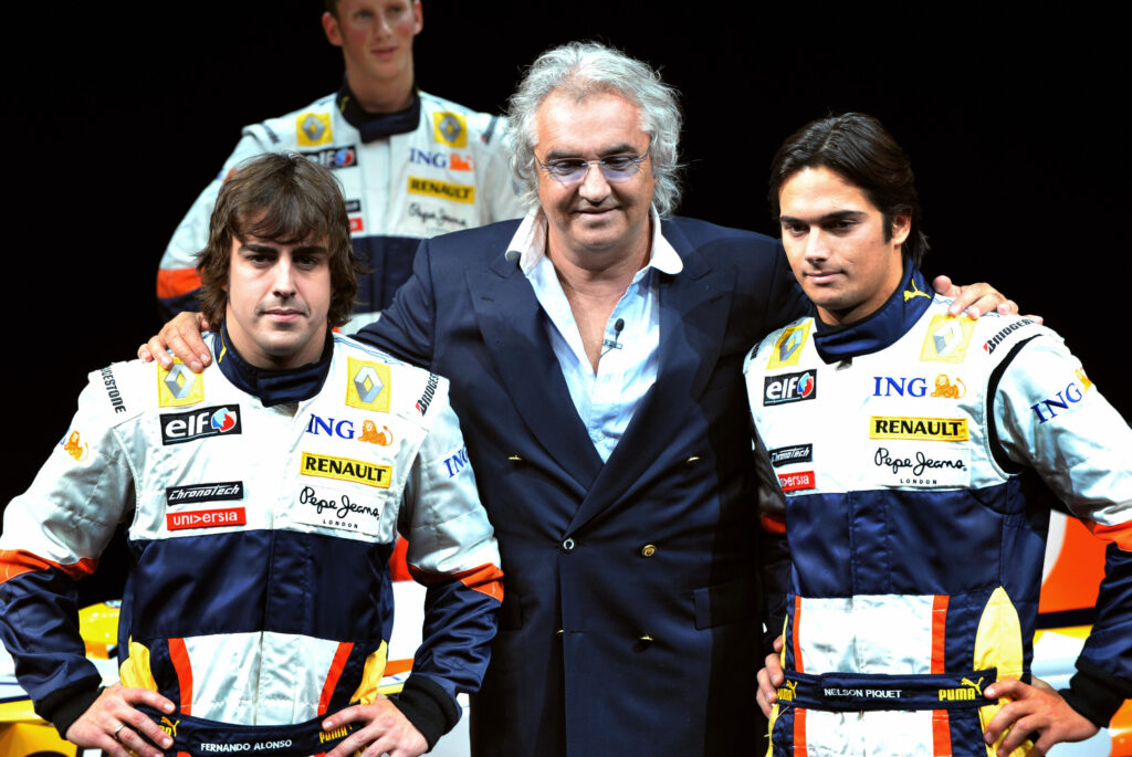 Flavio Briatore posing with Fernando Alonso and Nelson Piquet Jr at the launch of Renault's 2008 F1 car.