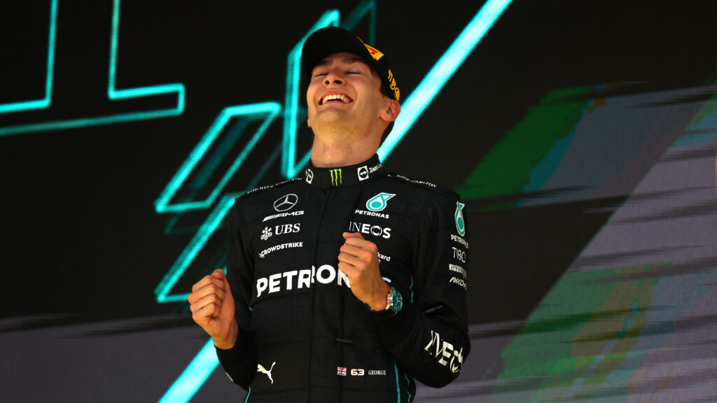 George Russell of Mercedes celebrates after taking his maiden win at the 2022 Brazilian Grand Prix