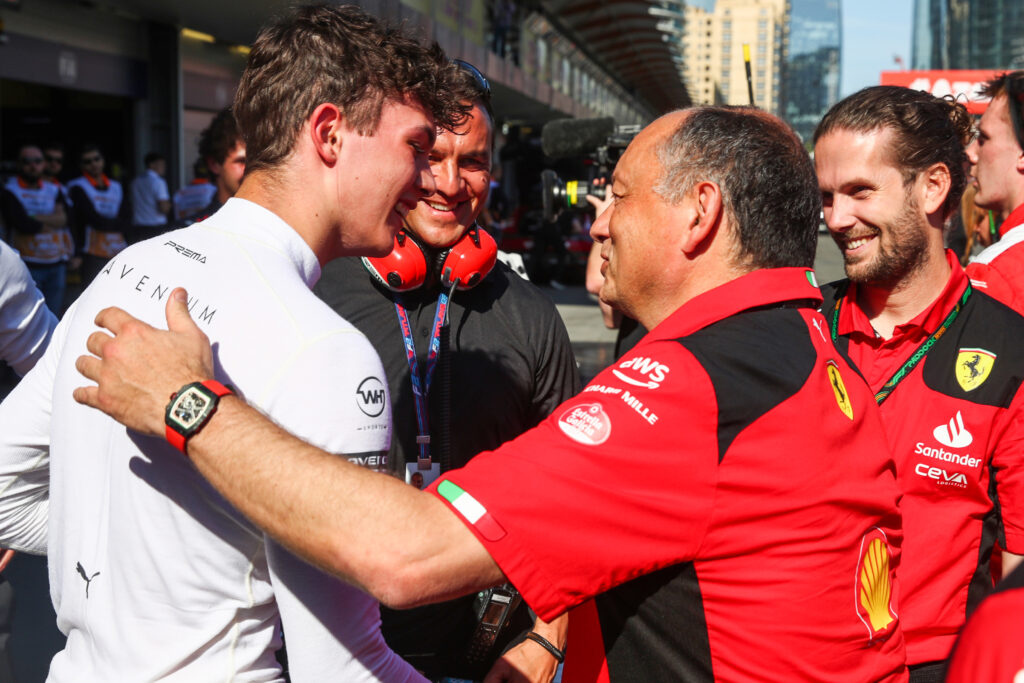 Oliver Bearman being congratulated by Ferrari team principal Frederic Vasseur at the 2023 Formula 2 Azerbaijan Grand Prix