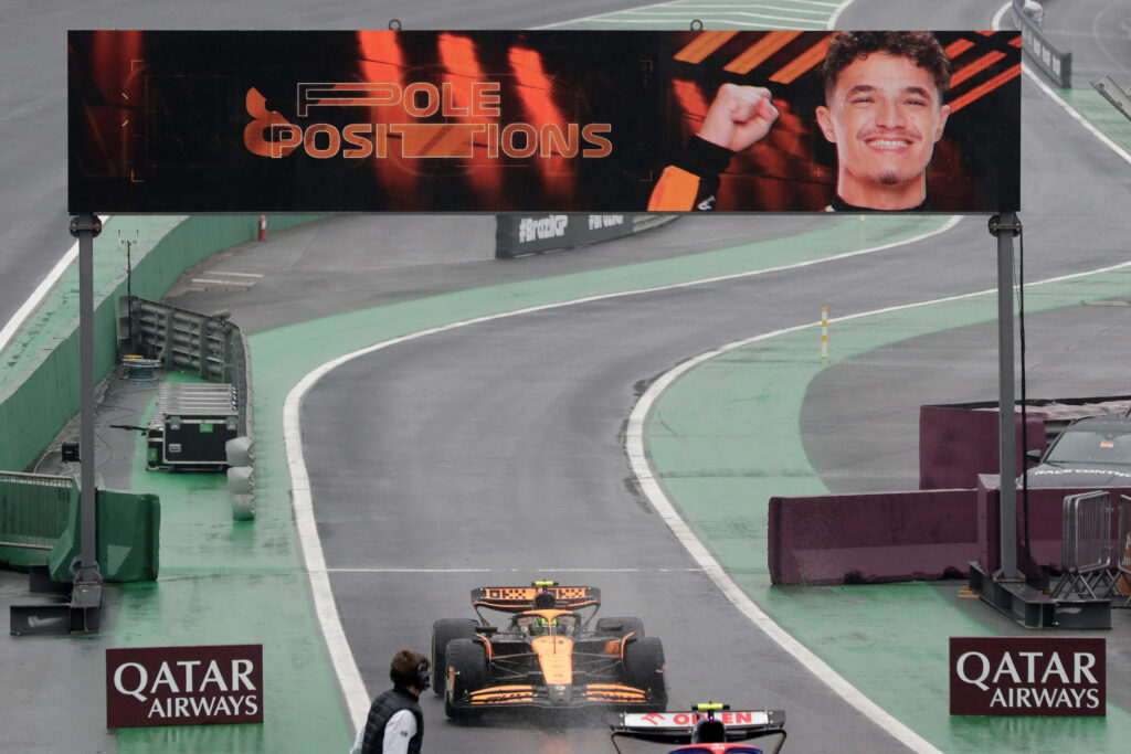 McLaren driver Lando Norris enters the Interlagos pit lane after scoring pole position in Brazil for the 2024 Sao Paulo Grand Prix
