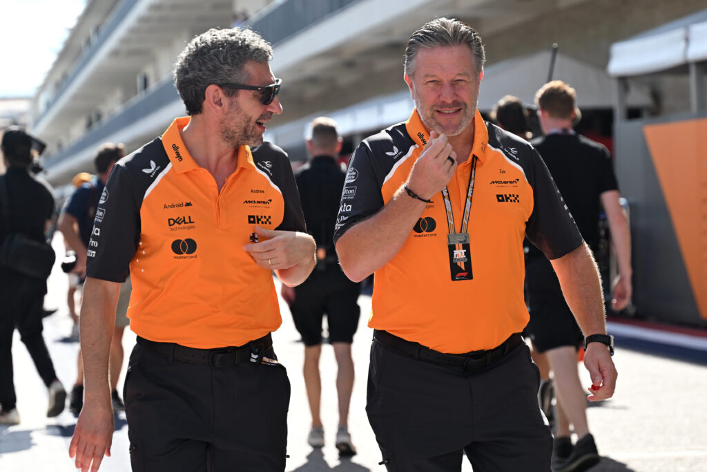 McLaren duo Andrea Stella and Zak Brown talk in the pit-lane at the 2025 United States Grand Prix