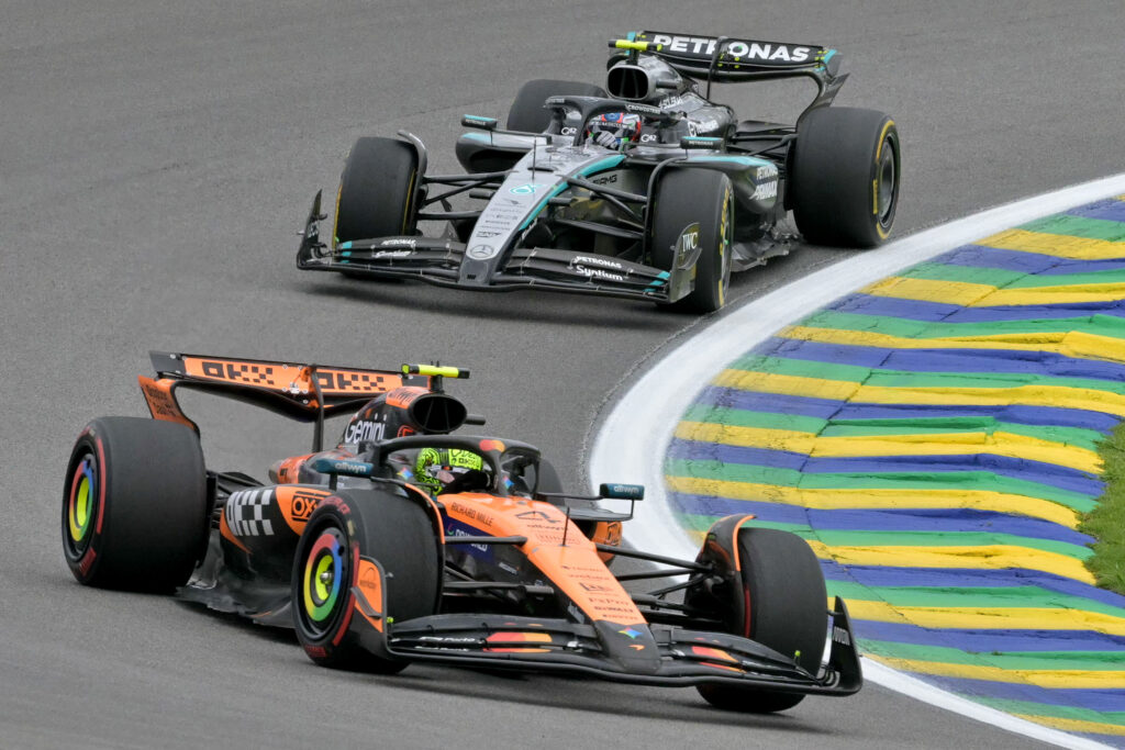 Lando Norris' McLaren leads from Kimi Antonelli's Mercedes during the Brazilian Grand Prix Sprint Race