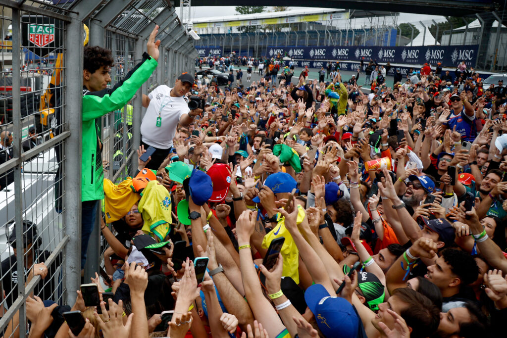 Sauber driver Gabriel Bortoleto greeting fans on the track at the 2025 Formula 1 Sao Paulo Grand Prix