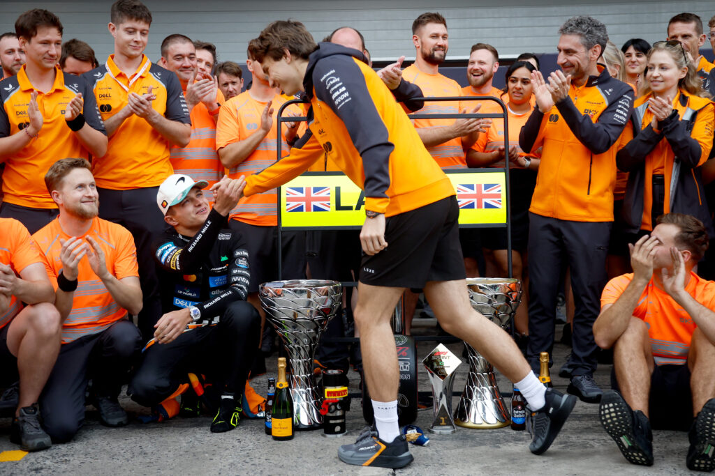 McLaren driver Oscar Piastri congratulates Lando Norris after winning the 2025 Formula 1 Sao Paulo Grand Prix