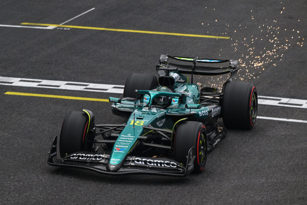 Aston Martin driver Lance Stroll crossing the finish line at the 2025 Formula 1 Sao Paulo Grand Prix
